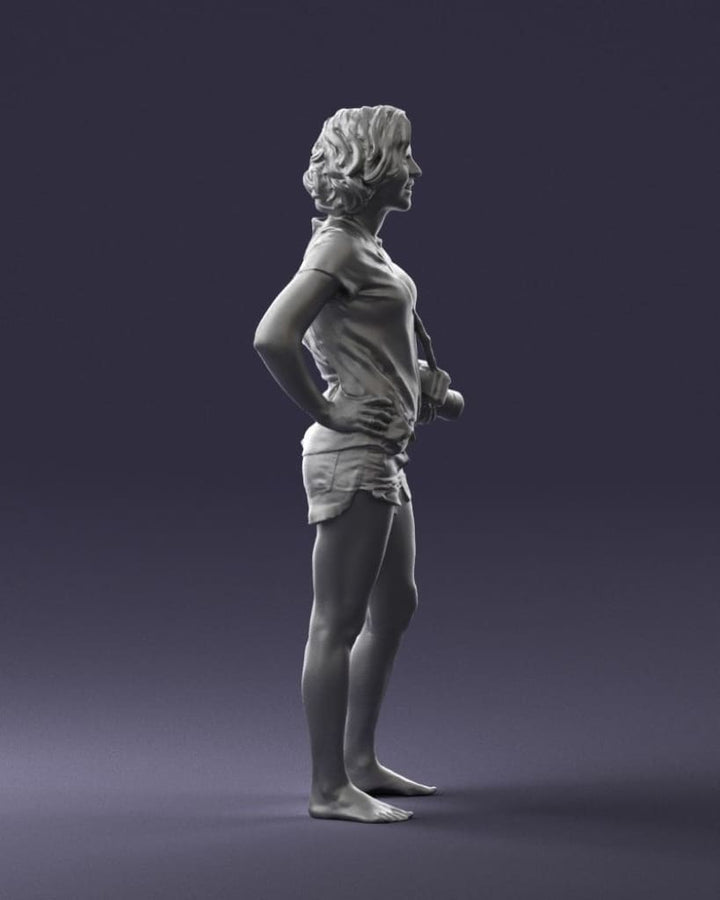Female In Shorts With Camera Figure